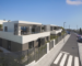 Modern apartment buildings along a newly built street