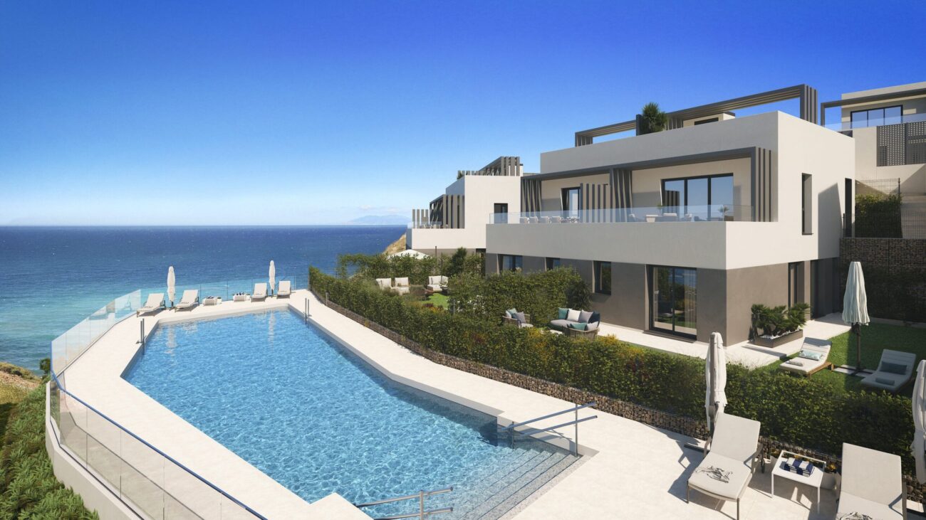 Semi-detached homes at Castillo de Lagos with infinity pool and sea views