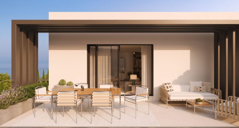 Private terrace with outdoor dining at sunset