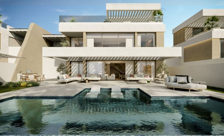 Villa facade with swimming pool and sun loungers
