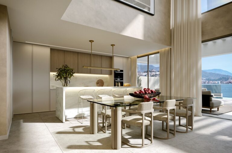 Open-plan kitchen and dining area with sea view