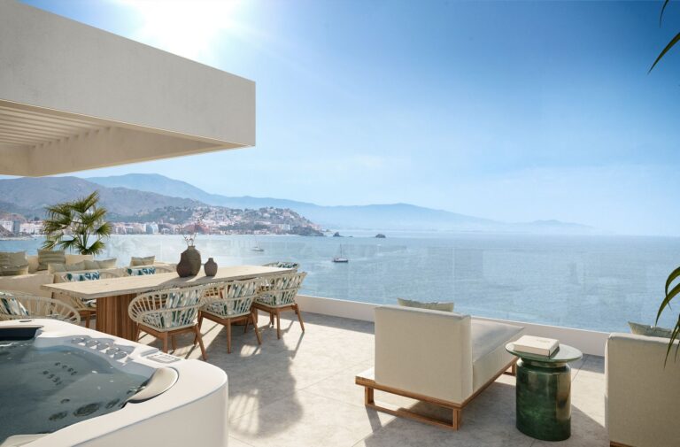 Roof terrace dining area with sea view