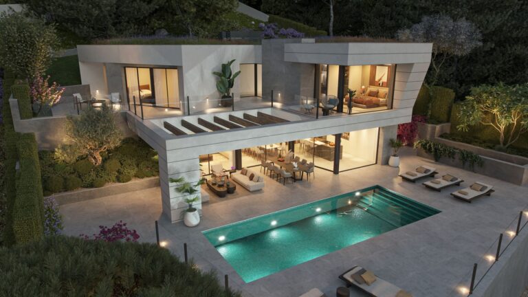 Villa with illuminated pool at dusk