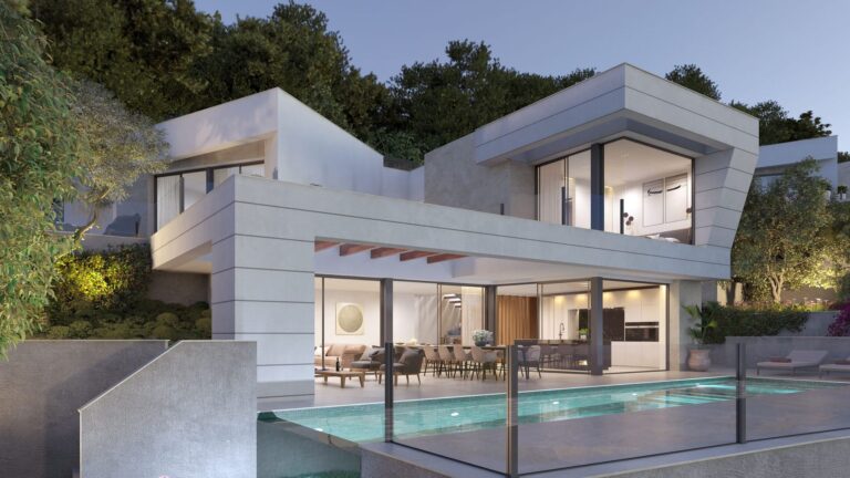 Villa with pool and terraces at dusk