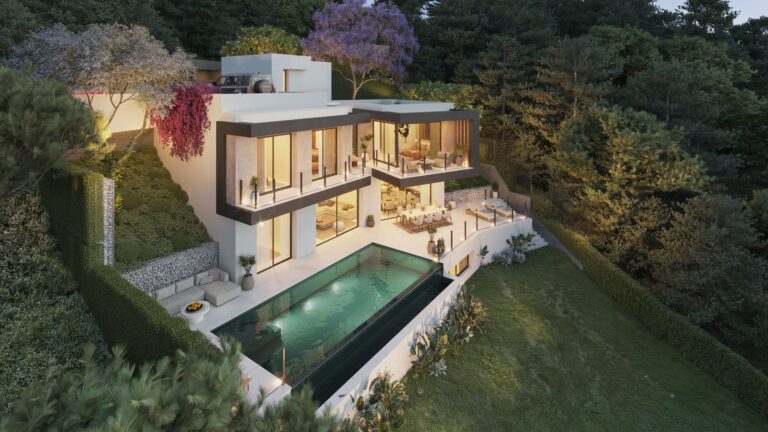 Villa and pool on the hillside at dusk
