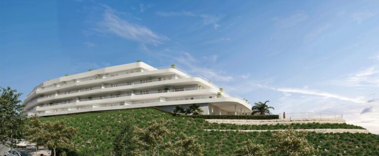 Curved white terraces of Sunset Views set into the green hillside